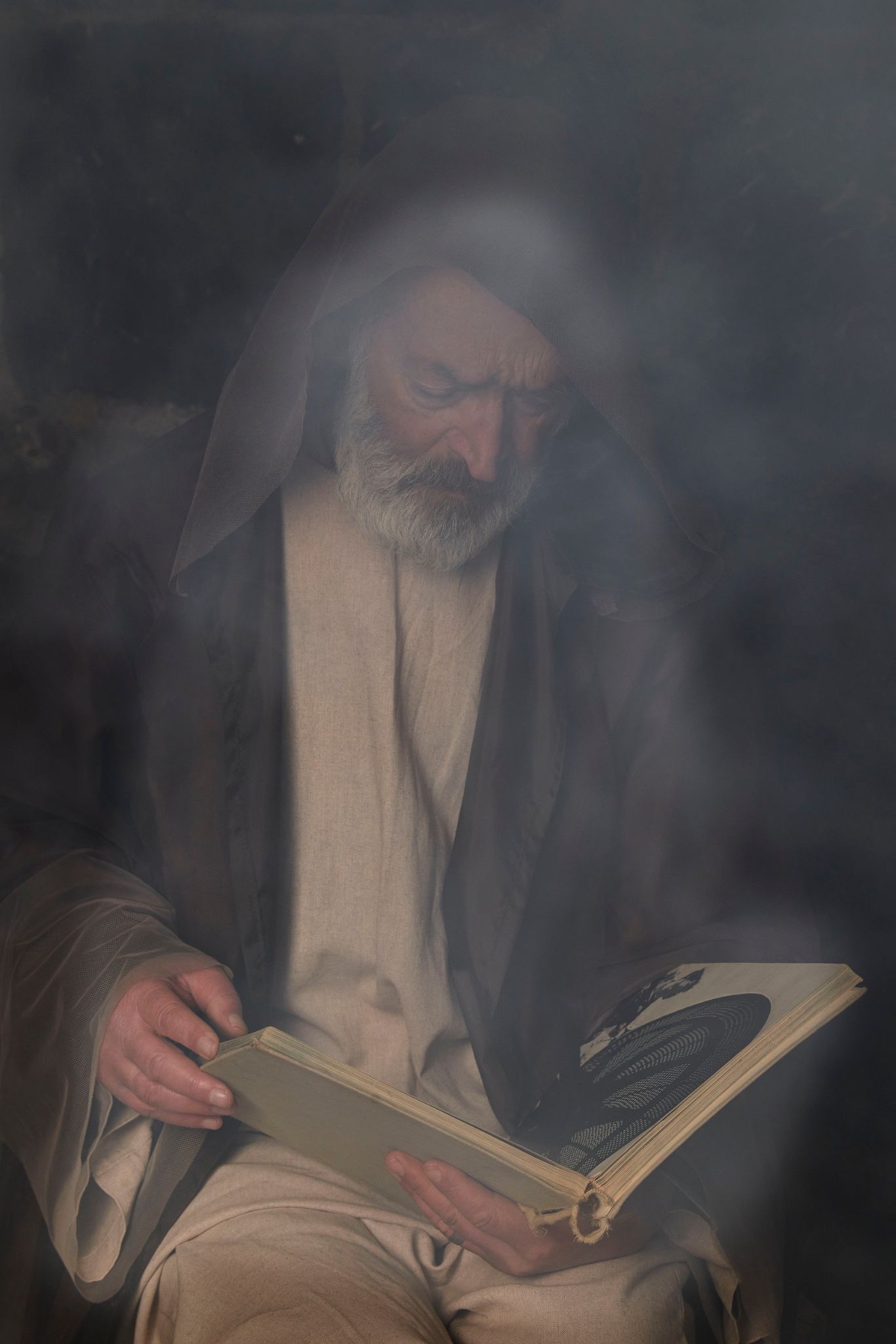 The Old Man reading